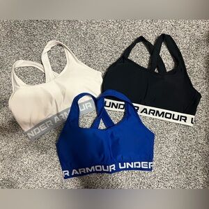 3 women’s Large Under Armour Sports bras.